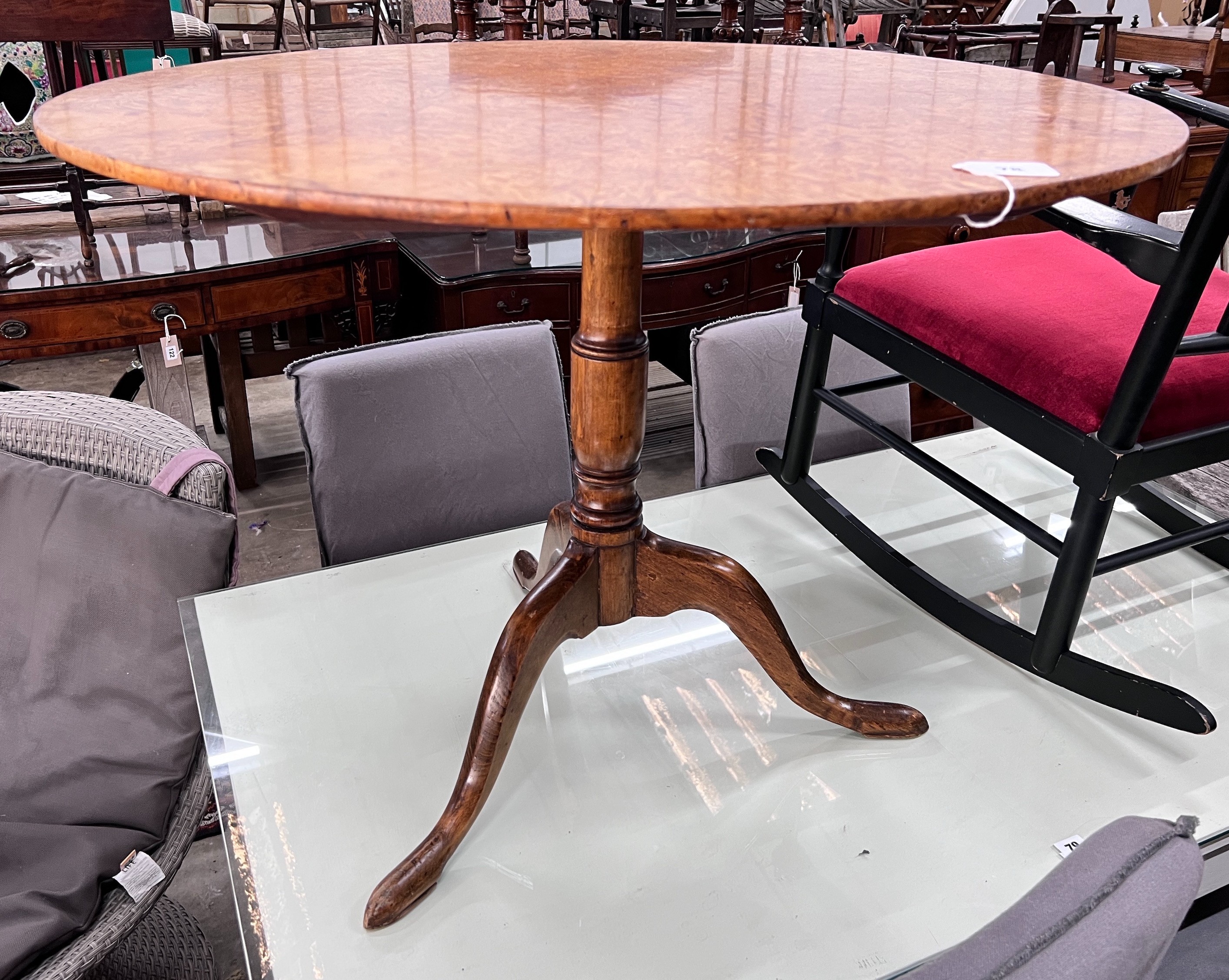 A George III bird's eye maple circular tilt top tripod tea table, diameter 88cm, height 67cm *Please note the sale commences at 9am.
